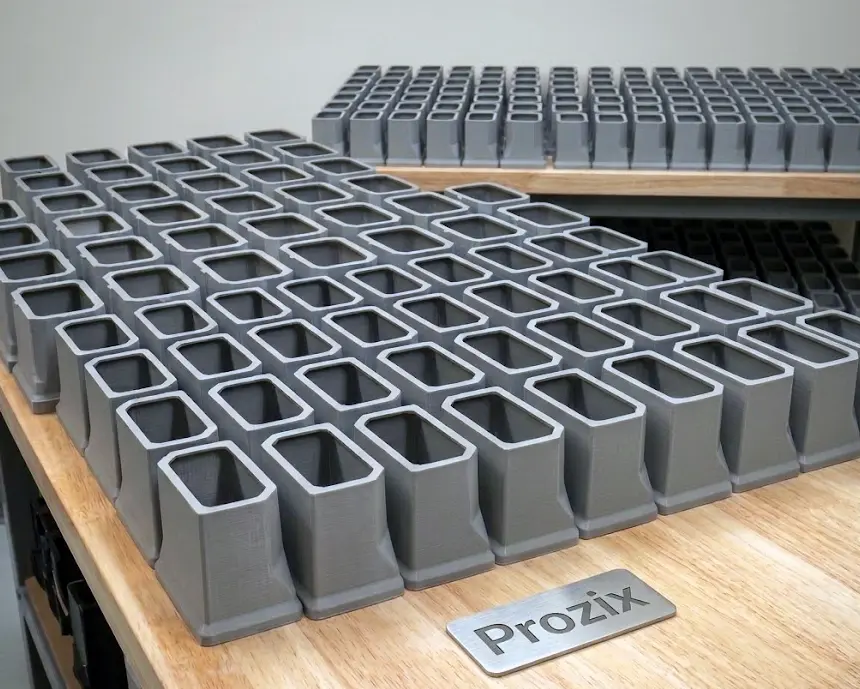 A large batch of 3D printed industrial components manufactured for NewBasis LLC at the Prozix 3D print farm.